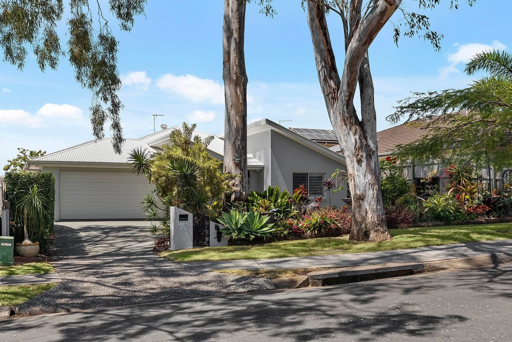 front of property in brisbane, part of a downsizing property purchase
